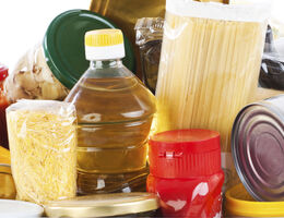 An assortment of pasta and canned and jarred food.